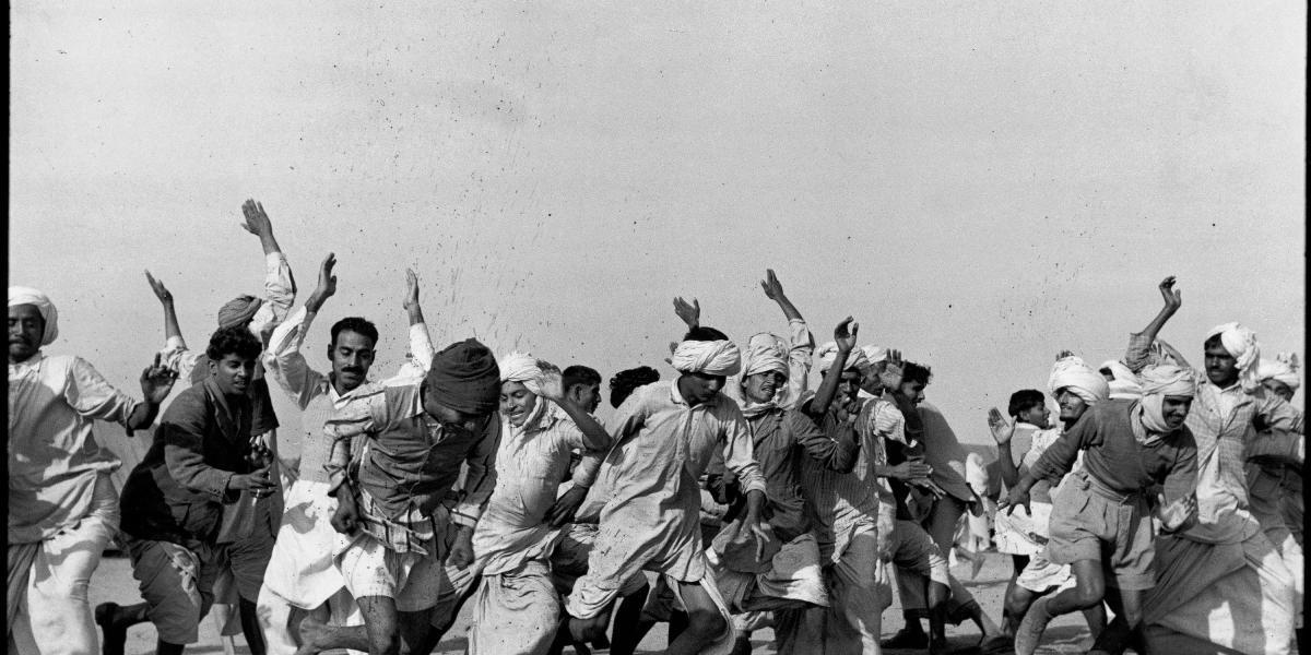 INDIA. Punjab. Kurukshetra. A refugee camp for 300.000 people. Refugees exercising in
the camp to drive away lethargy and despair. Autumn 1947.