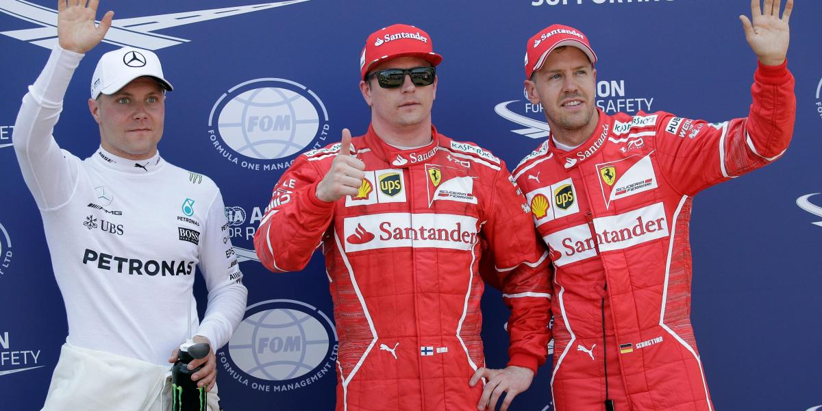 Kimi Raikkonen, junto a Bottas y Vettel.