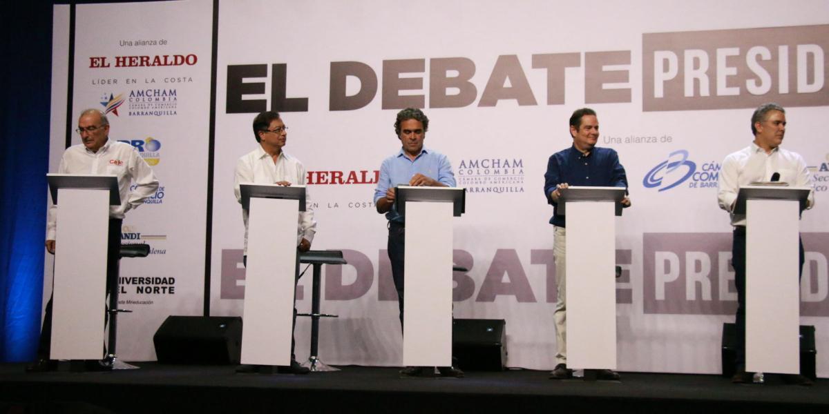 Los candidatos presentes en el debate de este jueves.