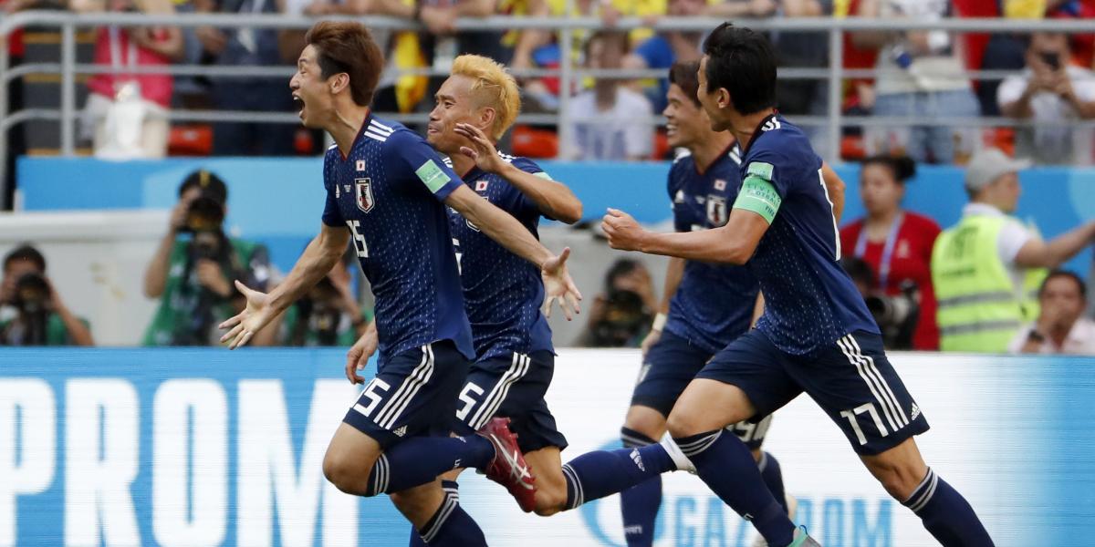 Jugadores de Japón celebraron este domingo.
