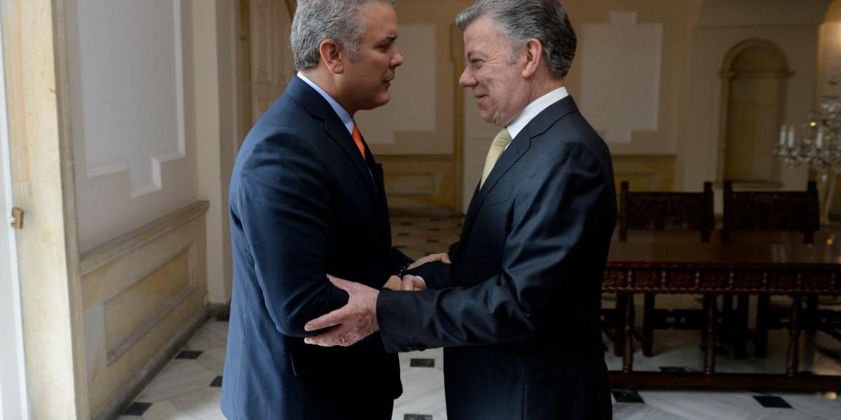 Juan Manuel Santos e Iván Duque en la Casa de Nariño.