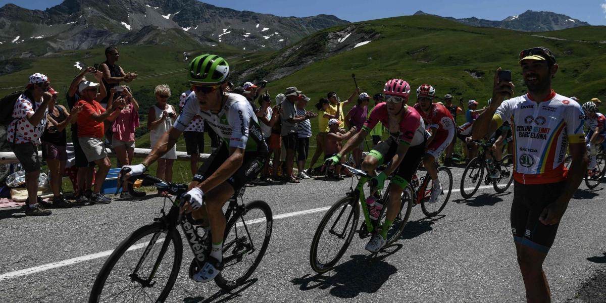 Belgium's Serge Pauwels (L) rides in a breakaway group during the twelfth stage of the 105th edition of the Tour de France cycling race, between Bourg-Saint-Maurice - Les Arcs and l'Alpe d'Huez, on July 19, 2018.