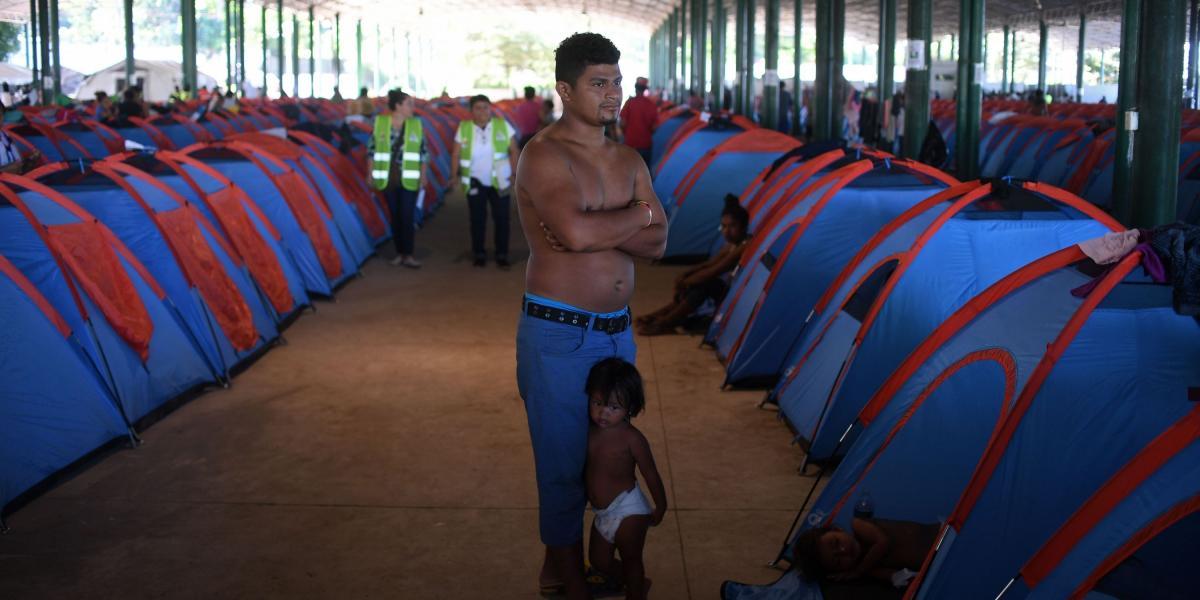 Inmigrantes hondureños pasaron la noche del domingo 21 de octubre en un campamento de la Cruz Roja ubicado en la localidad mexicana de Tapachula.