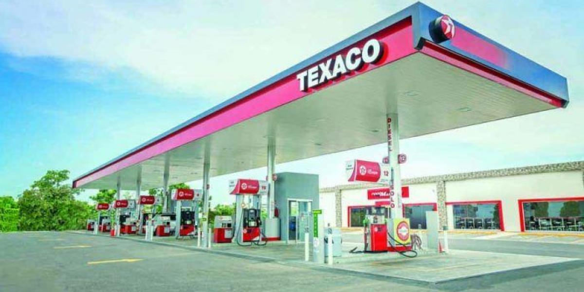 Chevron, la petrolera dueña de las estaciones Texaco del país, compró la mayoría de las dos plantas de combustibles.