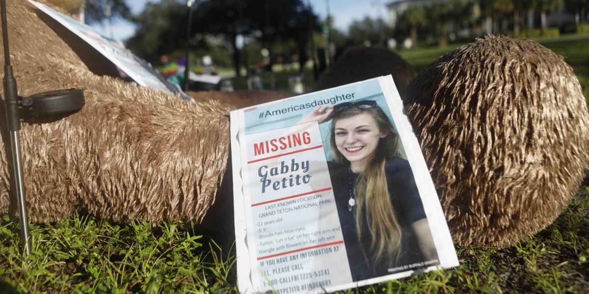 n this file photo taken on September 20, 2021, a makeshift memorial dedicated to missing Gabby Petito is located near City Hall in North Port, Florida. - Gabby Petito, the young woman who died on a road trip across the United States with her boyfriend that she had chronicled on Instragram and YouTube, was strangled to death, the local coroner said October 12, 2021. (Photo by Octavio Jones / GETTY IMAGES NORTH AMERICA / AFP)