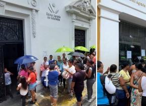 Filas para reclamar el subsidio en sedes del Banco Agrario en Cali y Barranquilla.