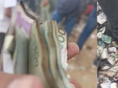 Personas se lanzaron a recoger dinero en Riohacha tras robo.