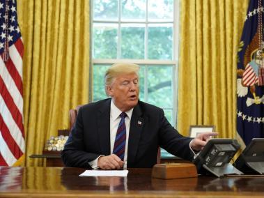 El presidente de Estados Unidos, Donald Trump, habla por teléfono con su homólogo de México, Henrique Peña Nieto, sobre el acuerdo comercial alcanzado.