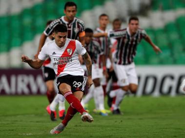 Gonzalo Montiel of River Plate scores a goal against Fluminense during a Copa Libertadores Group D soccer match at Maracana Stadium in Rio de Janeiro, Brazil, 22 April 2021.