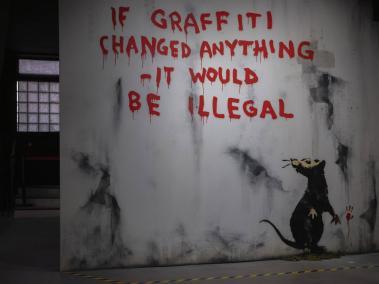 Una de las obras emblemáticas de Banksy que forma parte de las exposiciones europeas.