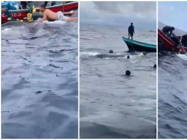En el vídeo se logra apreciar como los pescadores saltan al mar de distintas formas intentan liberar a la ballena.