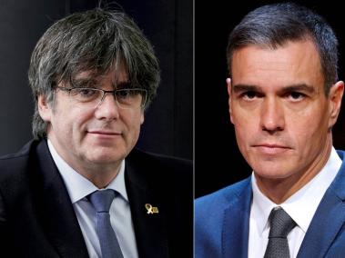 El expresidente catalán Carles Puigdemont (izq.) y el presidente en funciones del gobierno español, Pedro Sánchez.