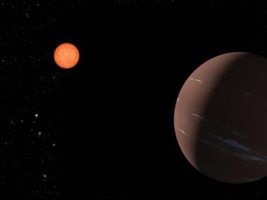 Esta ilustración muestra una forma en que el planeta TOI-715 b, una súper Tierra en la zona habitable alrededor de su estrella, podría aparecer ante un observador cercano.