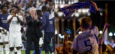 El entrenador del Real Madrid Carlo Ancelotti (2i) aplaude junto a sus jugadores al finalizar el partido de la jornada 34 de la Liga.