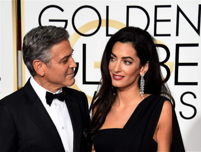 El actor George Clooney y su esposa Amal, fueron los anfitriones de una fiesta para recolectar fondos para la campaña de Clinton. Las entradas estaban entre los 33.400 y los 353.400 dólares. (AFP).