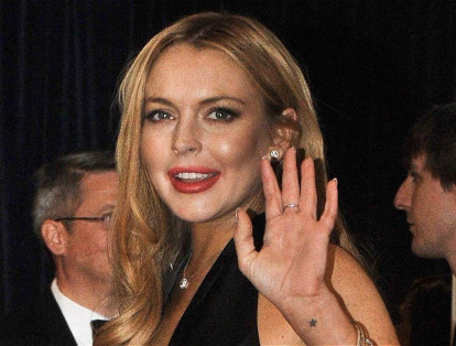 La actriz Lindsay Lohan usó su cuenta de Twitter para emitir un mensaje de Hillay Clinton acompañado por su foto. Fotografía (AFP).