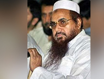 Es uno de los fundadores del grupo terrorista Lashkar-e-Taiba que opera desde Pakistán. Luego de los atentados en Bombai en el 2006 y 2008, Estados Unidos anunció que daría una recompensa de 10 millones de dólares a quien informara de su paradero. Actualmente, el islamista tiene una orden de captura en su contra.