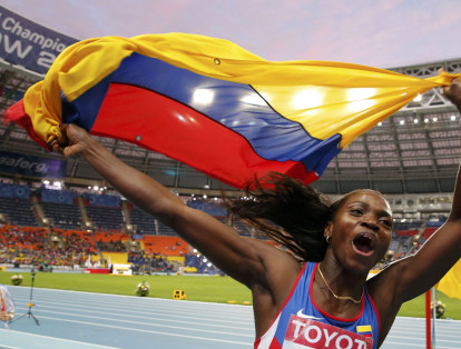Caterine Ibarguen of Colombia celebrates winning the gold after the women's triple jump final at the IAAF World Athletics Championships at the Luzhniki stadium in Moscow August 15, 2013.