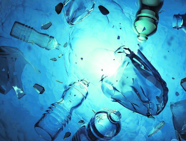 Plastic human waste including plastics bags floating in the open ocean. Water pollution 3D illustration.
