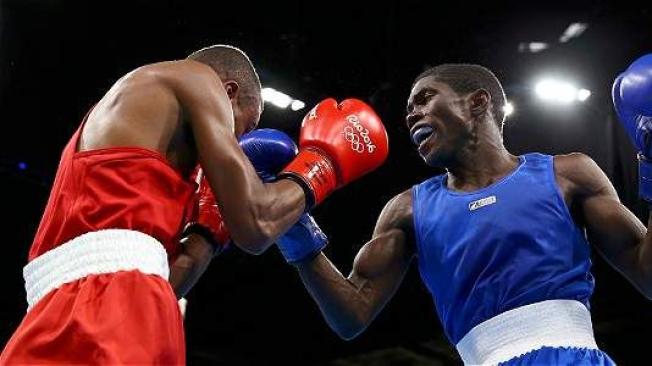 Yuberjén, durante su pelea de octavos de final en el boxeo de 49 kg de Río. Reuters