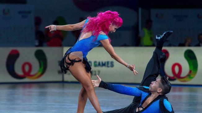 Yinessa Ortega y Steven Rebolledo, en su participación en baile deportivo en los Juegos Mundiales en Polonia, consiguiendo el oro para Colombia.