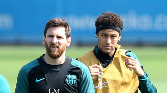 Neymar, junto a Lionel Messi.