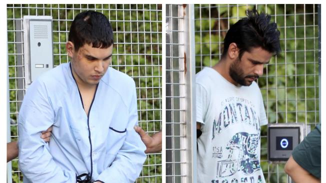 Los cuatro detenidos en relación con los atentados yihadistas cometidos el jueves pasado en Barcelona y Cambrils. Mohamed Houli Chemlal, Mohammed Alla, Dris Oukabir y Salah El Karibes, en su traslado hacia la Audiencia Nacional desde Tres Cantos