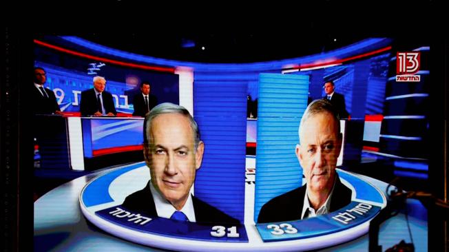 Benjamin Netanyahu y Beni Gantz, que se enfrentaron en las elecciones legislativas este martes en Israel.
