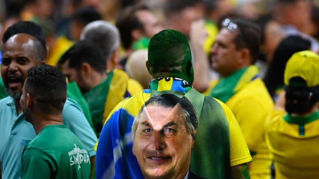 Simpatizantes de Bolsonaro acuden a su acto de campaña.