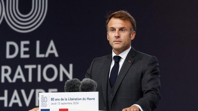 France's President Emmanuel Macron delivers a speech during a ceremony to commemorate the 80th anniversary of the World War II liberation of the port city of Le Havre, northern France, on September 12, 2024. (Photo by Benoit Tessier / POOL / AFP)