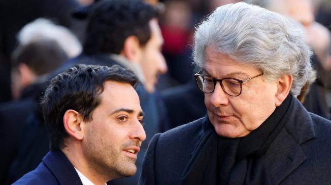 (FILES) Renaissance ruling party national secretary Stephane Sejourne (L) speaks with  EU commissioner for Internal Market Thierry Breton ahead of a national tribute ceremony for late French minister and European Union Commission president Jacques Delors at the Hotel des Invalides in Paris, on January 5, 2024. French President Emmanuel Macron has proposed outgoing Foreign Affairs Minister Stephane Sejourne as a European Commissioner &#145;focused on the issues of industrial and technological sovereignty and European competitiveness, following the resignation of the EU Commissioner for Internal Market, Thierry Breton, the Elysee presidential palace announced on September 16, 2024. (Photo by Ludovic MARIN / AFP)