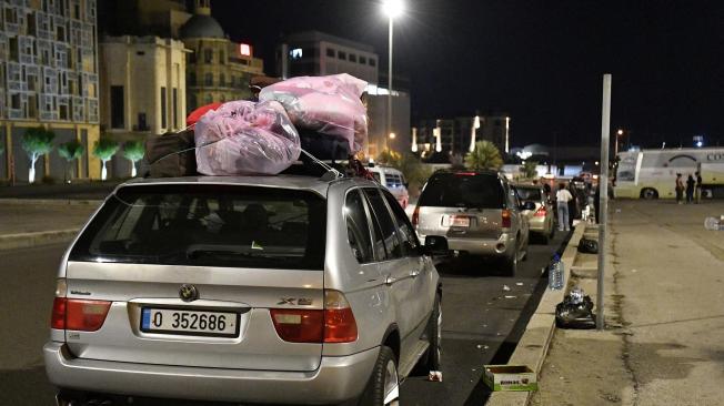 Personas en la Plaza de los Mártires en Beirut, Líbano, tras salir del sur del país.