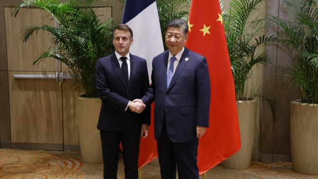 El presidente de Francia, Emmanuel Macron, y el presidente de China, Xi Jinping.