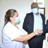 La enfermera Sandra Milena Hererra con la Gobernadora y director de Hospital Universitario del Valle