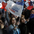 Los partidarios del presidente francés y candidato a la reelección Emmanuel Macron reaccionan después de los resultados en la primera ronda de las elecciones presidenciales francesas en París.