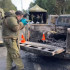 Captura de pantalla de un video cedido por Carabineros de Chile que muestra los peritajes a vehículo policial que resultó quemado.