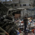 Al Nusairat Refugee Camp (---), 12/09/2024.- An internally displaced Palestinian boy inspects the rubble at the UNRWA-run school-turned-shelter of al-Jaouni, a day after the structure was hit by an Israeli airstrike, in Al-Nusairat refugee camp, central Gaza Strip, 12 September 2024. According to the Palestinian Ministry of Health in Gaza, at least 18 Palestinians were killed and dozens were injured in the strike. The United Nations agency for Palestine refugees (UNRWA) said at least six of their workers were among the victims. The Israeli military stated that it conducted a 'precise strike' on militants operating inside a Hamas command and control center in the area of Nuseirat in central Gaza. More than 41,000 Palestinians and over 1,400 Israelis have been killed, according to the Palestinian Health Ministry and the Israel Defense Forces (IDF), since Hamas militants launched an attack against Israel from the Gaza Strip on 07 October 2023, and the Israeli operations in Gaza and the West Bank which followed it. EFE/EPA/MOHAMMED SABER