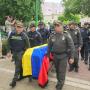 Sepelio de uno de los policías asesinados en esta escalada violenta.