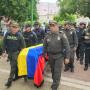 Sepelio de uno de los policías asesinados en esta escalada violenta.