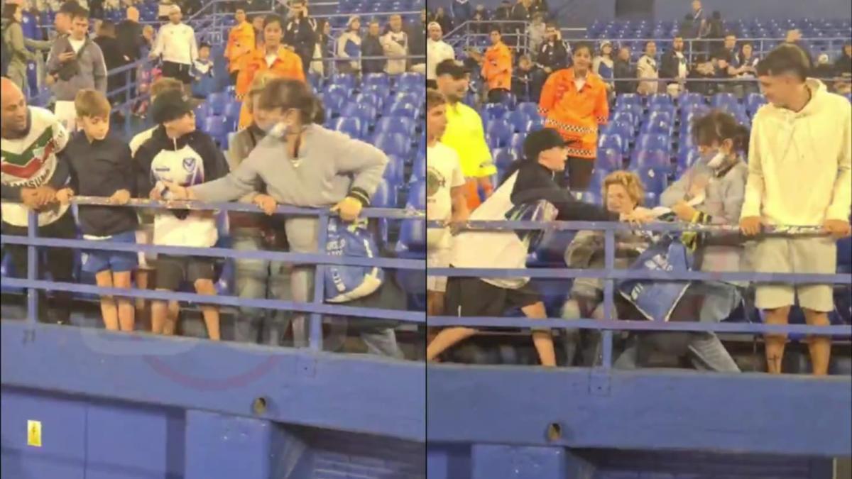 Momento exacto en el que una mujer pelea con un niño por la camiseta de Agustín Bouzat después de un partido en Argentina