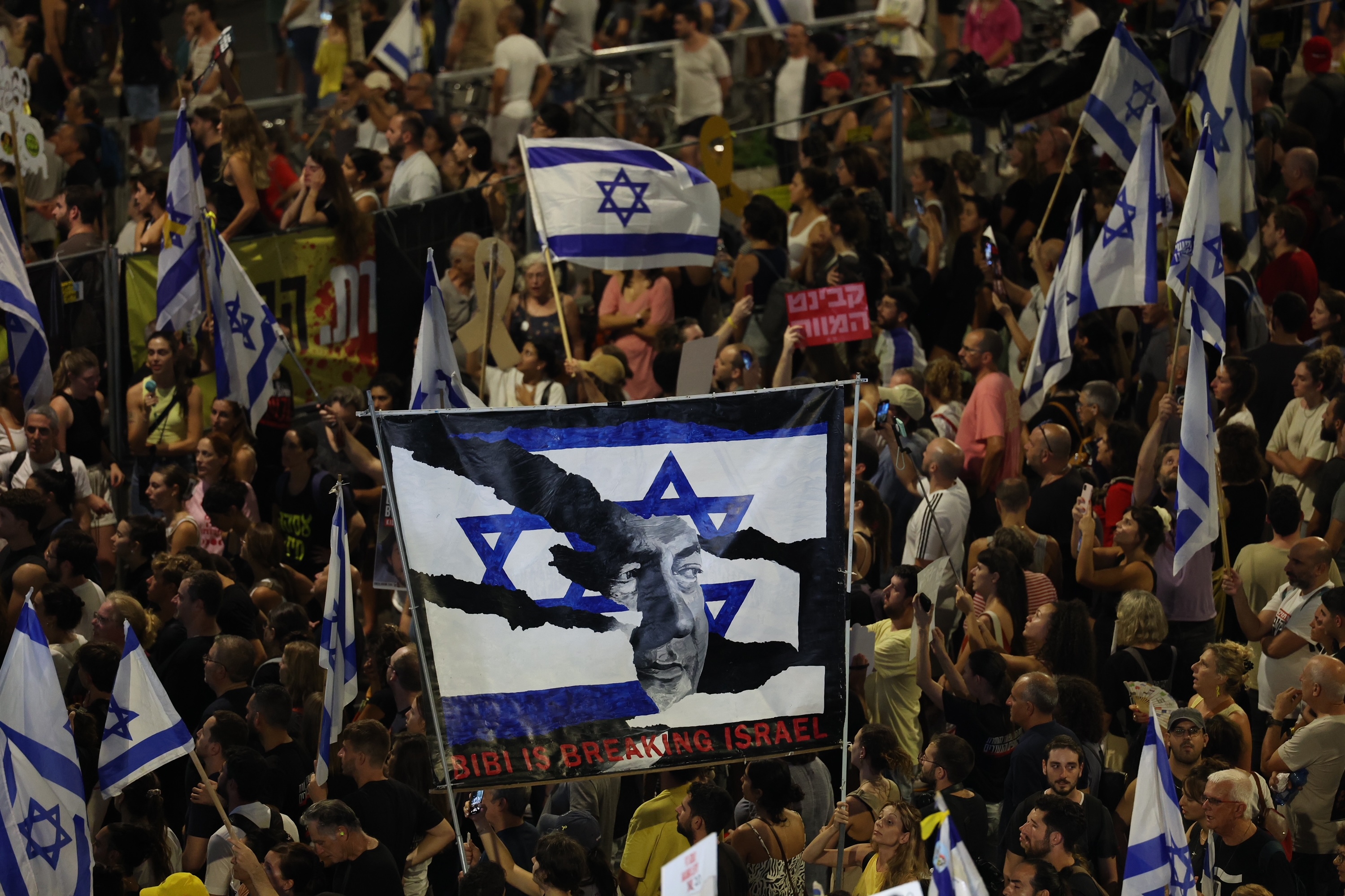 Thousands of demonstrators in support of the families of Israeli hostages held by Hamas in Gaza take part in a protest rally in front of the Kyria military headquarters in Tel Aviv, Israel, on September 01, 2024.