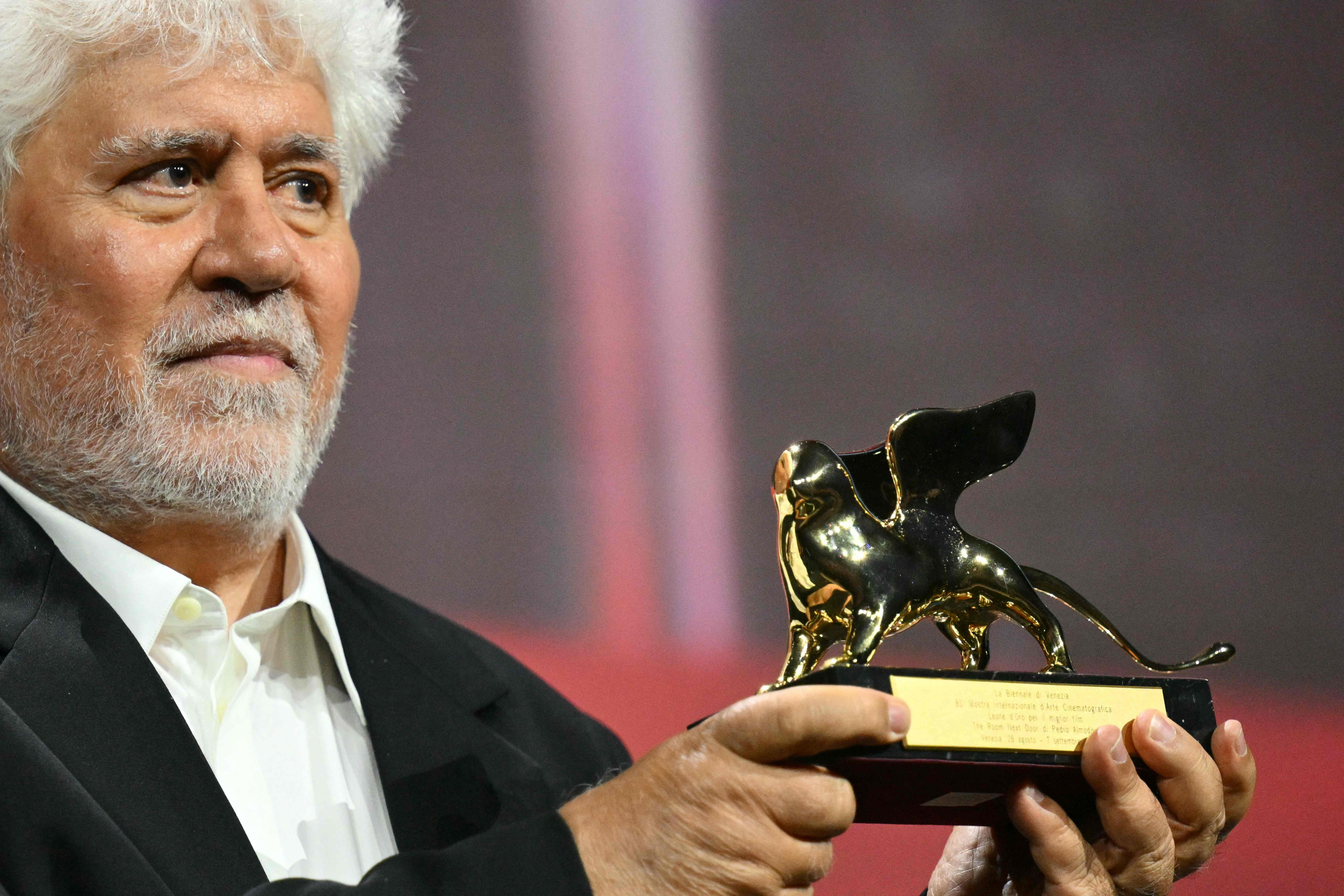 Spanish director Pedro Almodovar poses with the Golden Lion for Best Film he reveived for 'The Room Next Door' during the award ceremony of the 81st Venice Film Festival on September 7, 2024 at Venice Lido. (Photo by Alberto PIZZOLI / AFP)