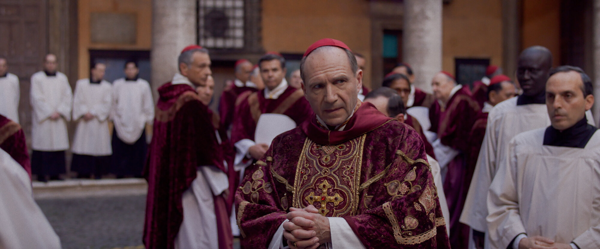 (L to R) Brían F. O'Byrne as Cardinal O'Malley and Ralph Fiennes as Cardinal Lawrence in director Edward Berger's CONCLAVE, a Focus Features release. Credit: Courtesy of Focus Features. © 2024 All Rights Reserved.