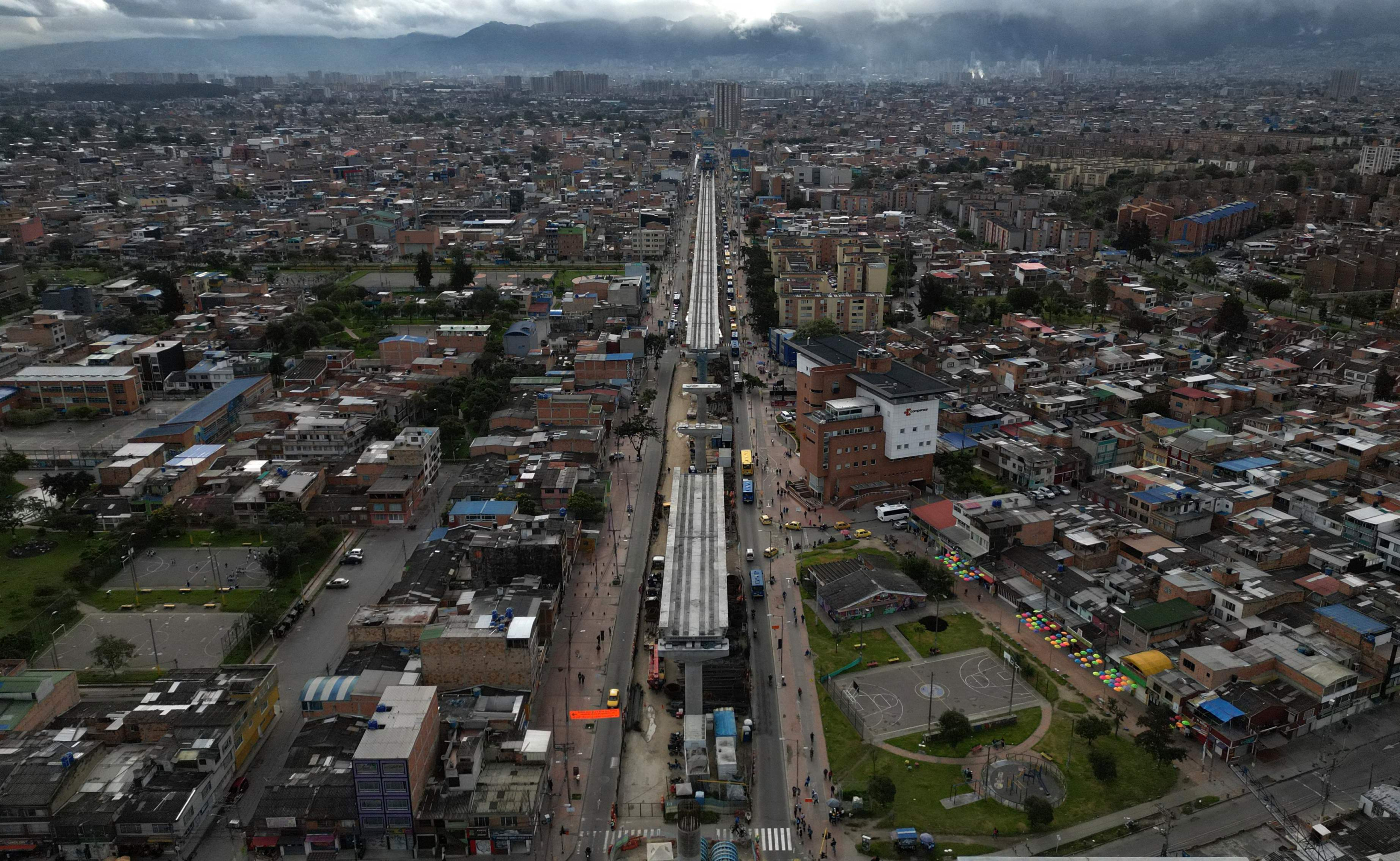 Aerial view of the progress in the construction of the first line of the metro in Bogota on May 13, 2025. (Photo by Raul ARBOLEDA / AFP)